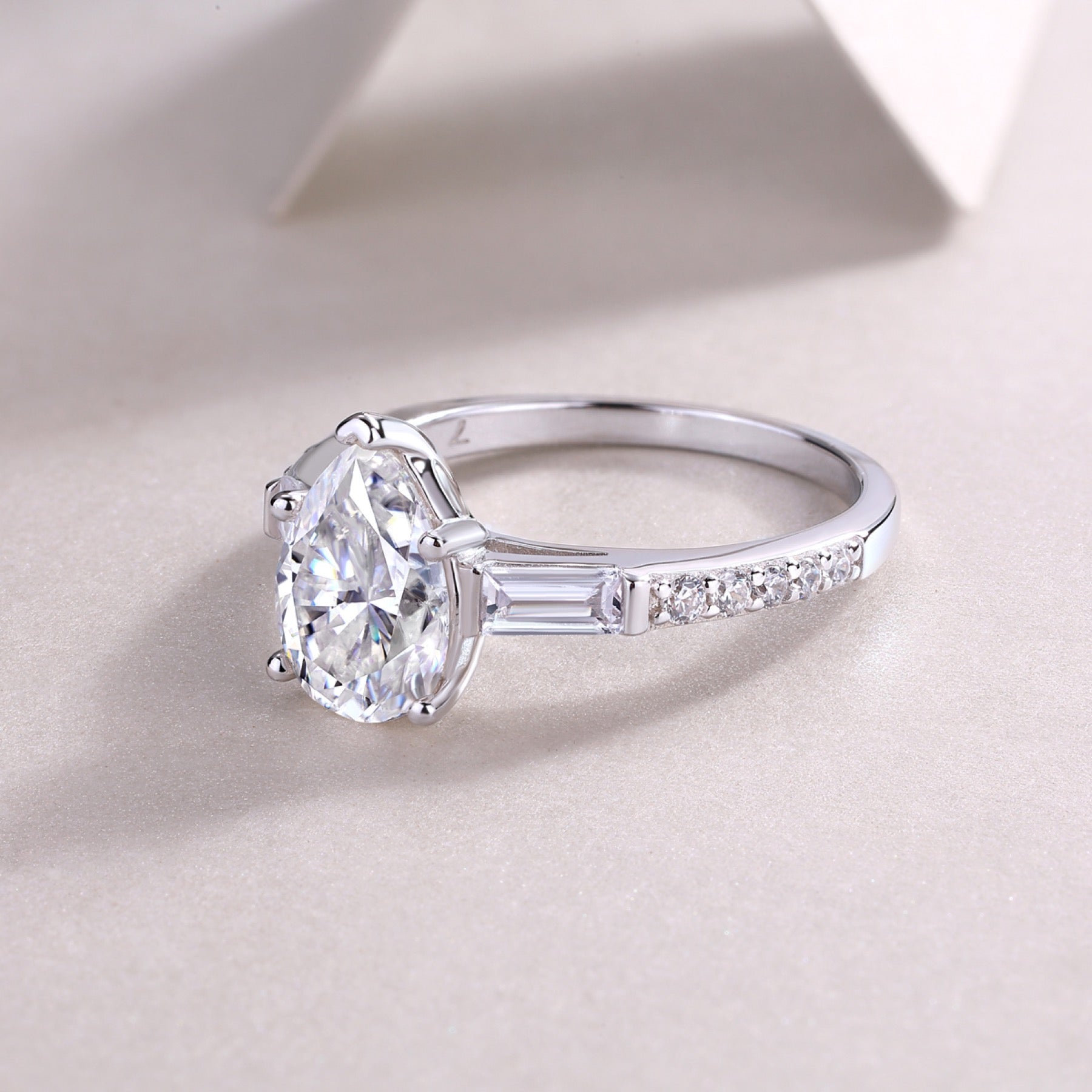Moonlight Pear-Cut Moissanite Three-Stone Ring in Sterling Silver
