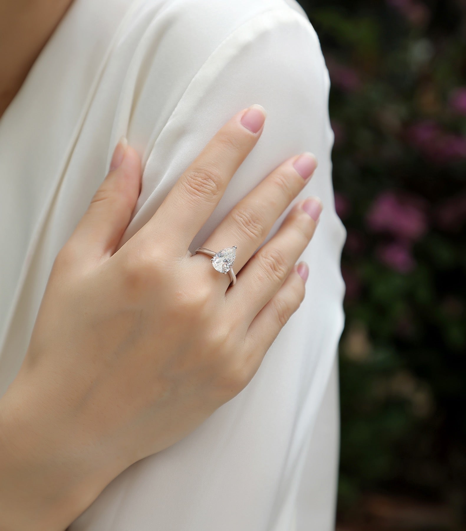 Minima Pear-Cut Moissanite Solitaire Ring in Sterling Silver