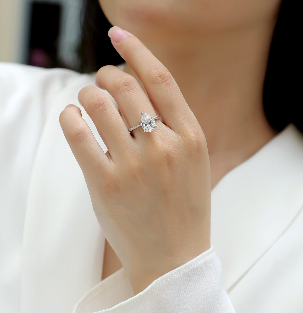 Minima Pear-Cut Moissanite Solitaire Ring in Sterling Silver