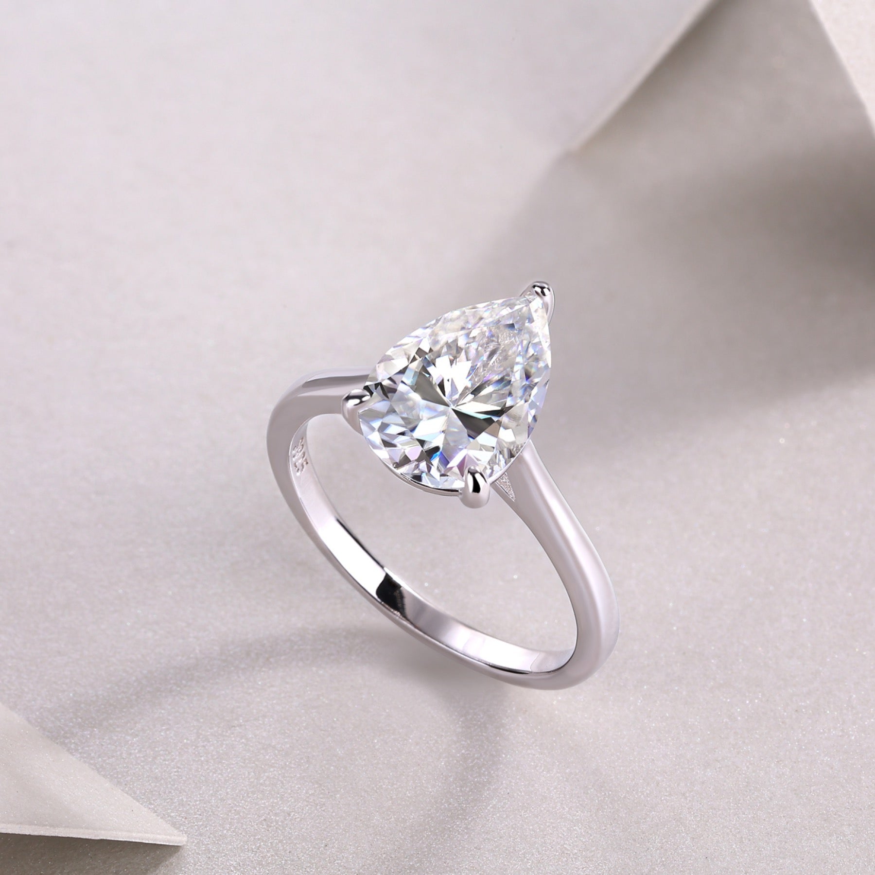 Minima Pear-Cut Moissanite Solitaire Ring in Sterling Silver