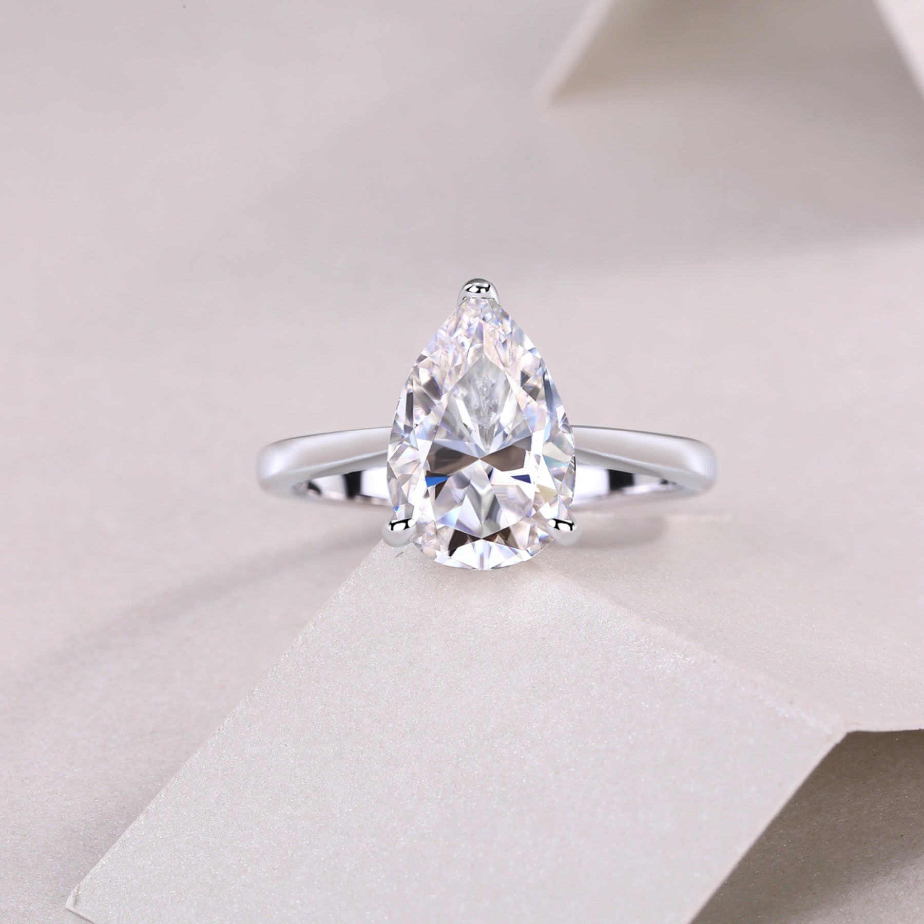 Minima Pear-Cut Moissanite Solitaire Ring in Sterling Silver