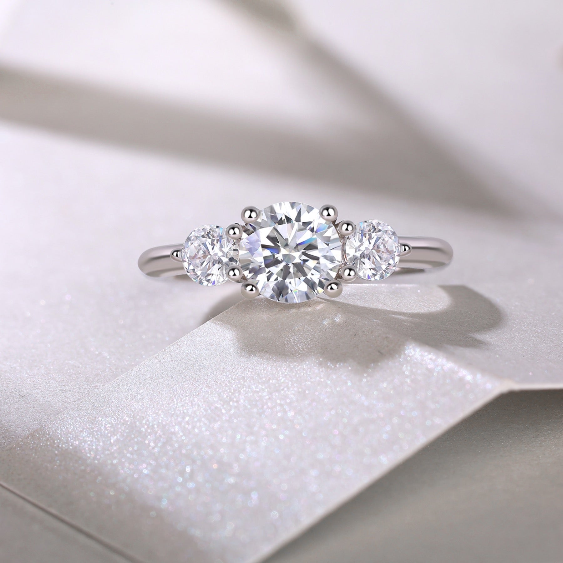 Prelude Moissanite Three-Stone Ring in Sterling Silver