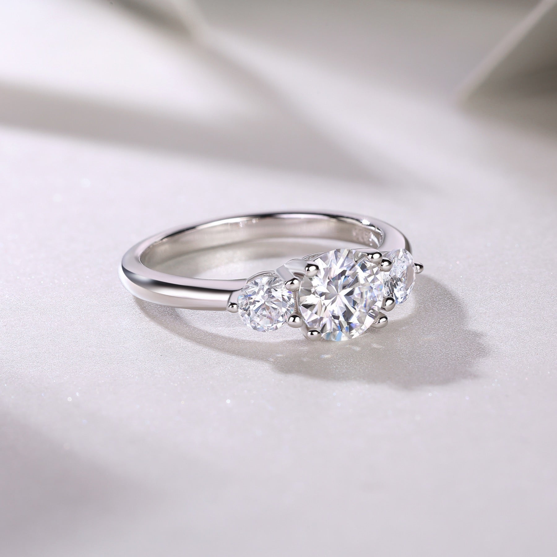 Prelude Moissanite Three-Stone Ring in Sterling Silver