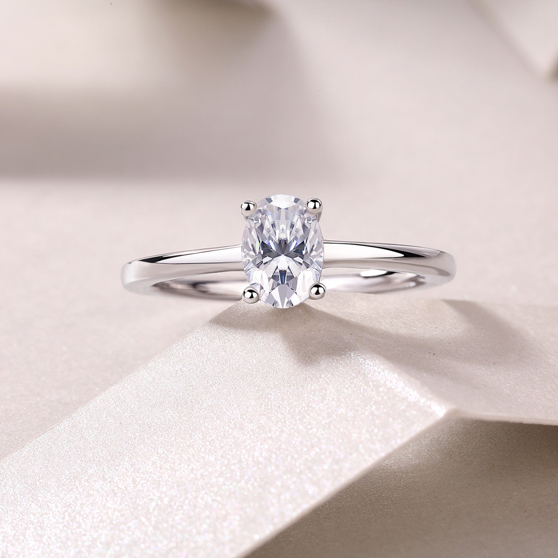 Constant Oval-Cut Moissanite Solitaire Ring in Sterling Silver