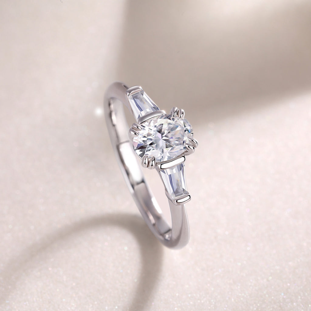 Descend Oval-Cut Moissanite Three-Stone Ring in Sterling Silver