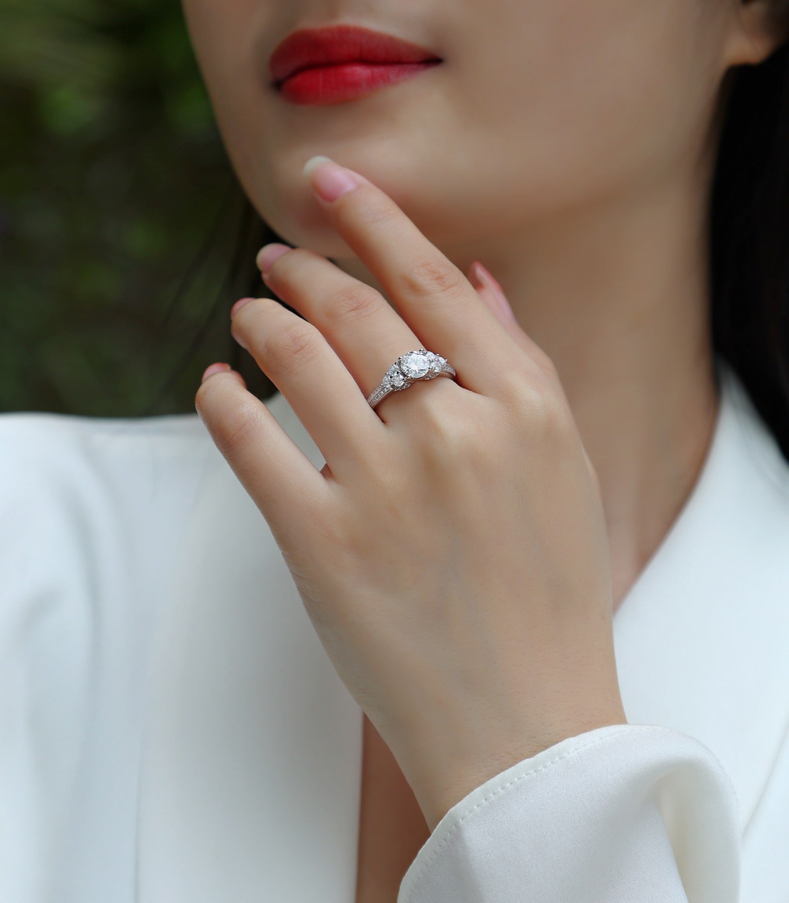 Coral Moissanite Three-Stone Ring in Sterling Silver