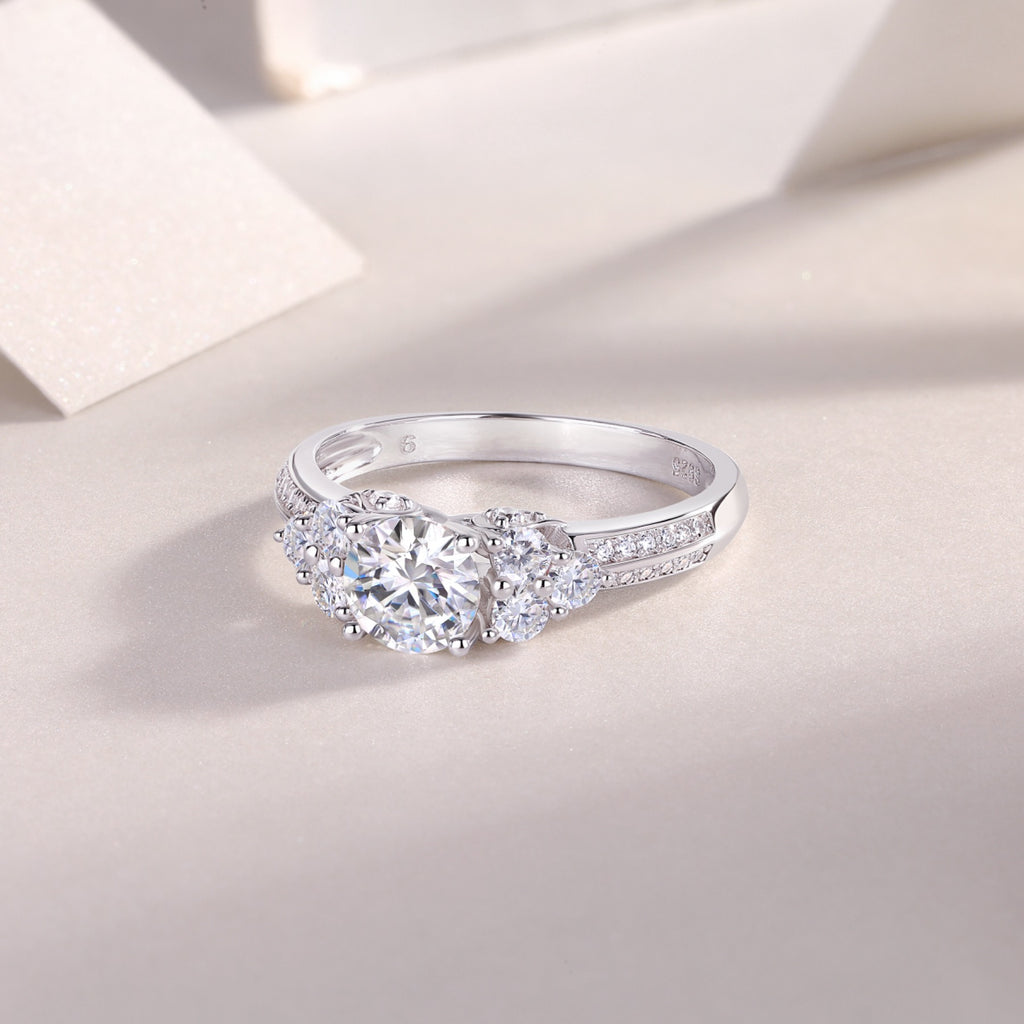 Coral Moissanite Three-Stone Ring in Sterling Silver