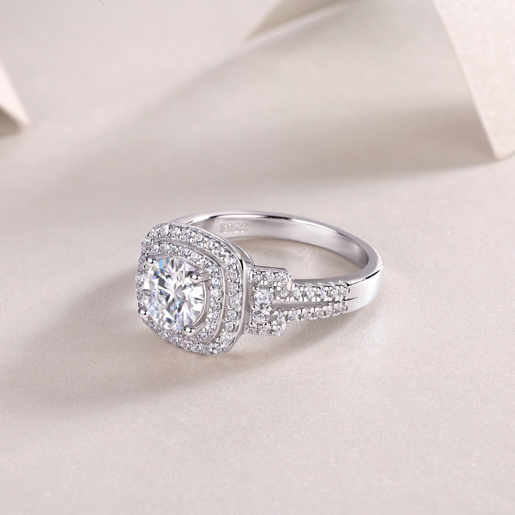 Molten Moissanite Halo Ring in Sterling Silver