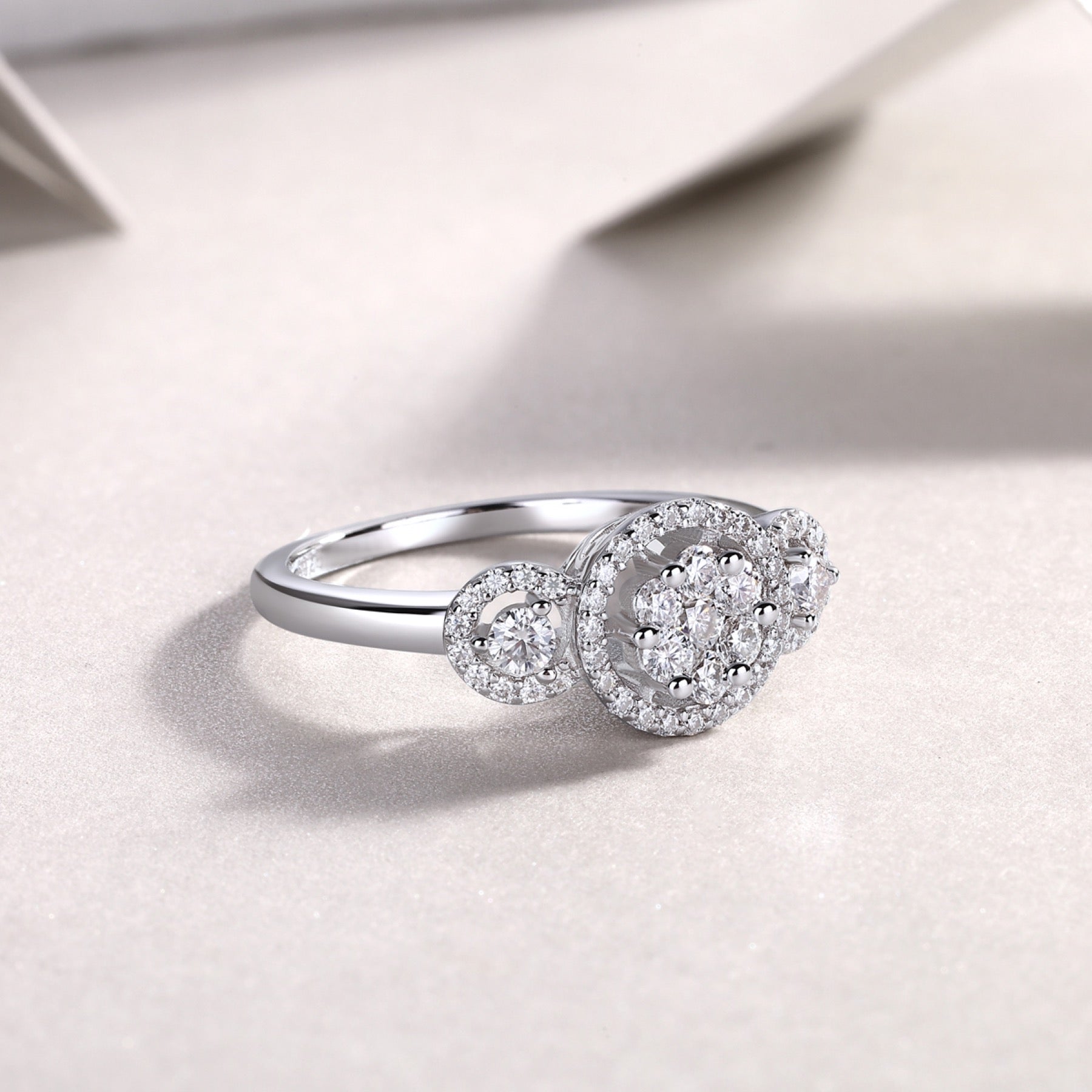 Linked Moissanite Three-Stone Ring in Sterling Silver