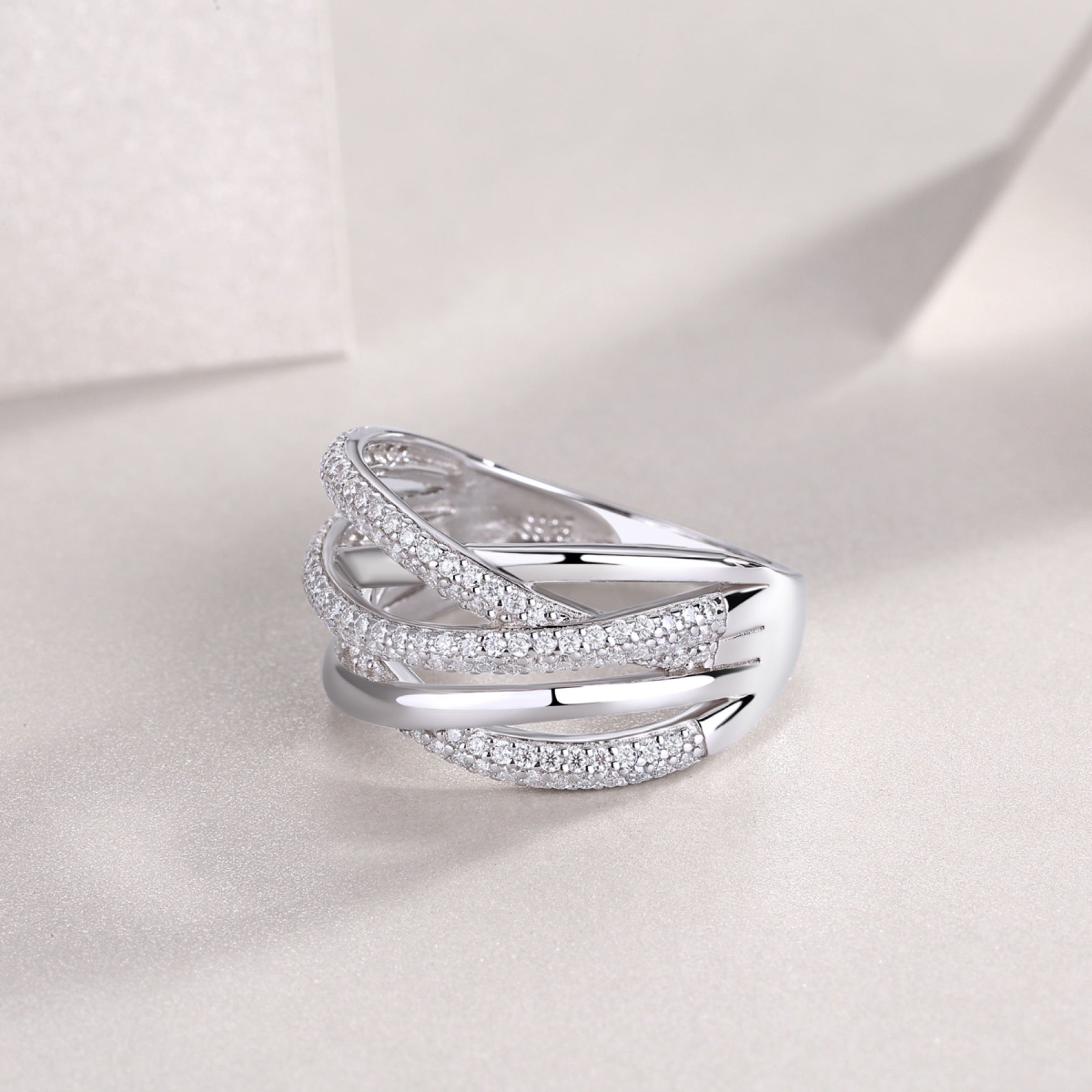 Interwoven Moissanite Band Ring in Sterling Silver