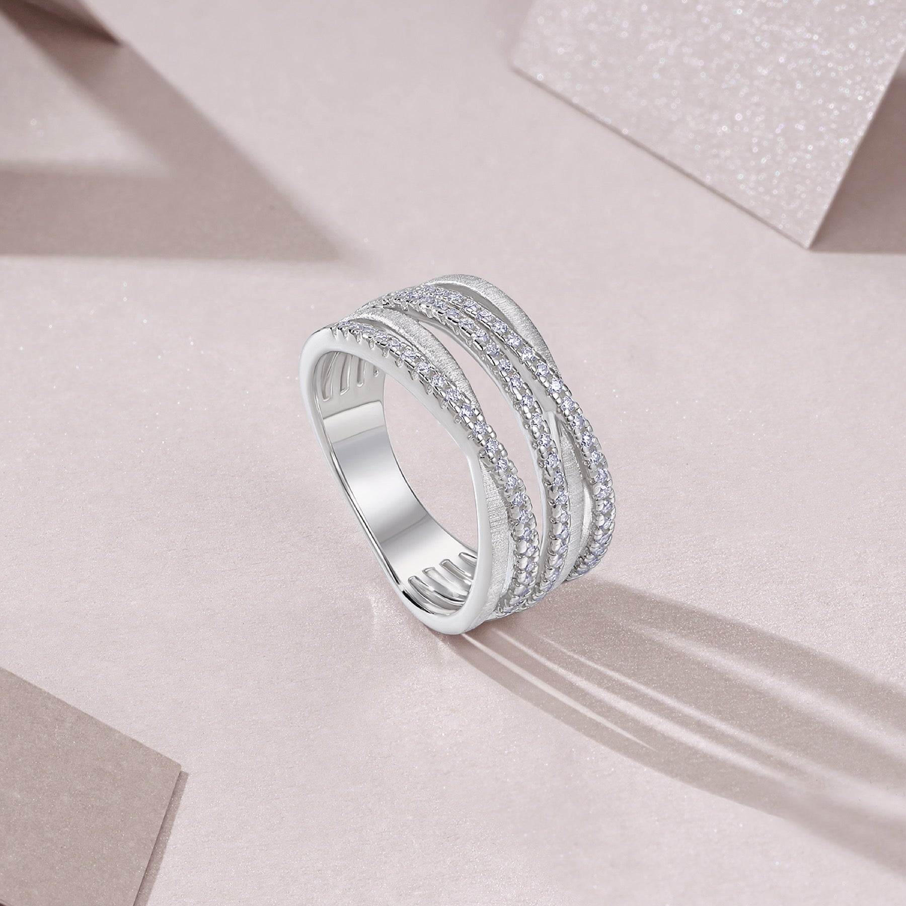 Strand Moissanite Band Ring in Sterling Silver