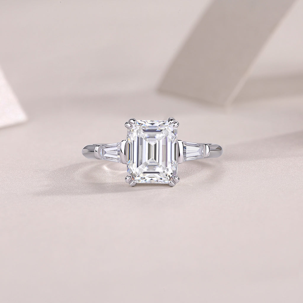 Reflekt Emerald-Cut Moissanite Three-Stone Ring in Sterling Silver