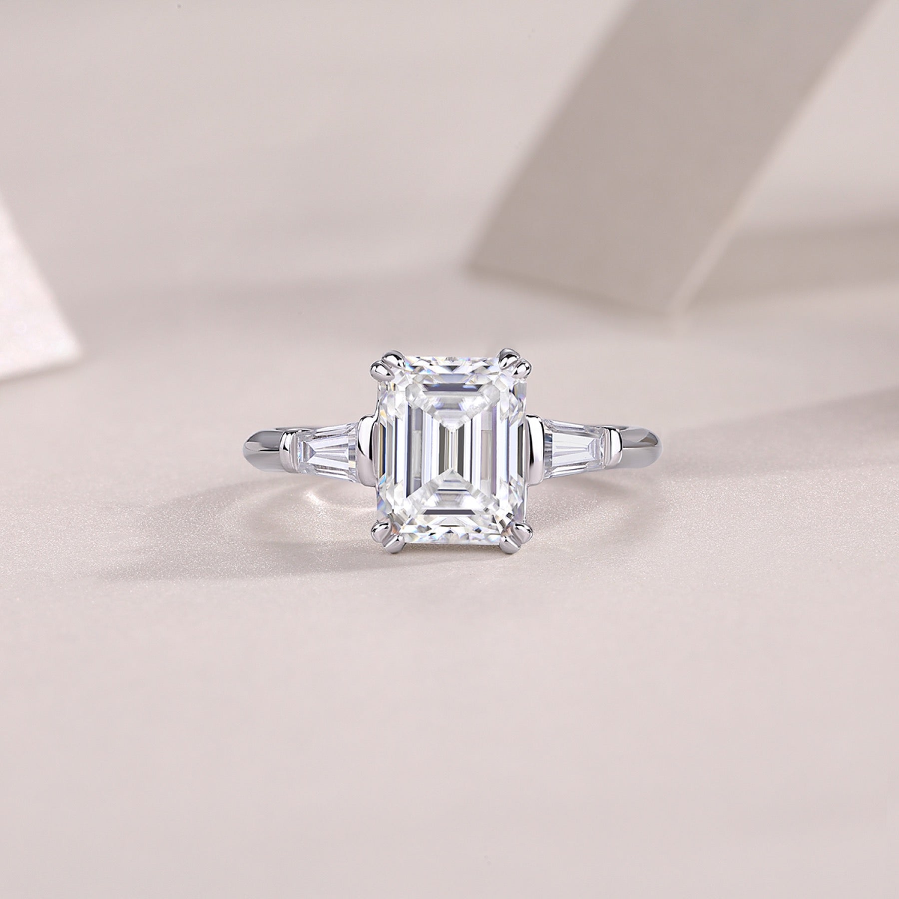 Reflekt Emerald-Cut Moissanite Three-Stone Ring in Sterling Silver