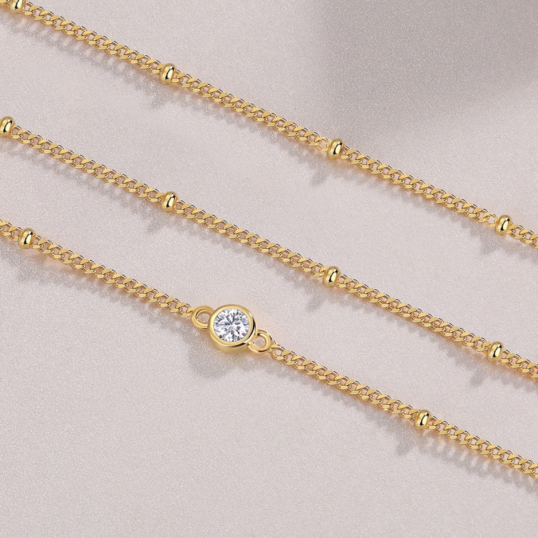 Orizzonte Moissanite Bangle Bracelet in Gold-Tone Sterling Silver