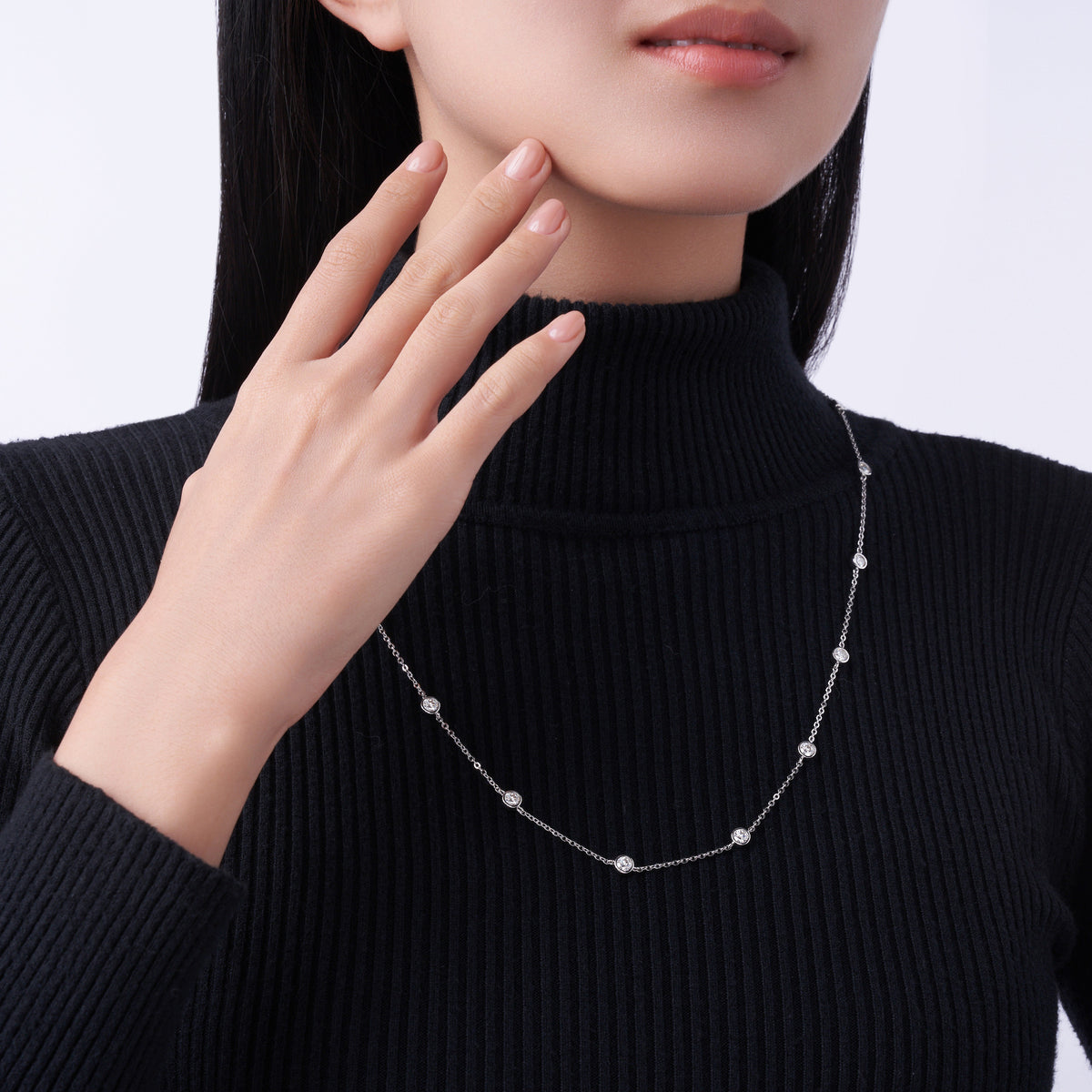 Stazioni Moissanite Station Necklace in Sterling Silver, shown worn