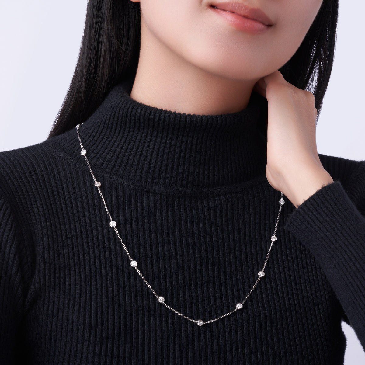 Stazioni Moissanite Station Necklace in Sterling Silver, shown worn