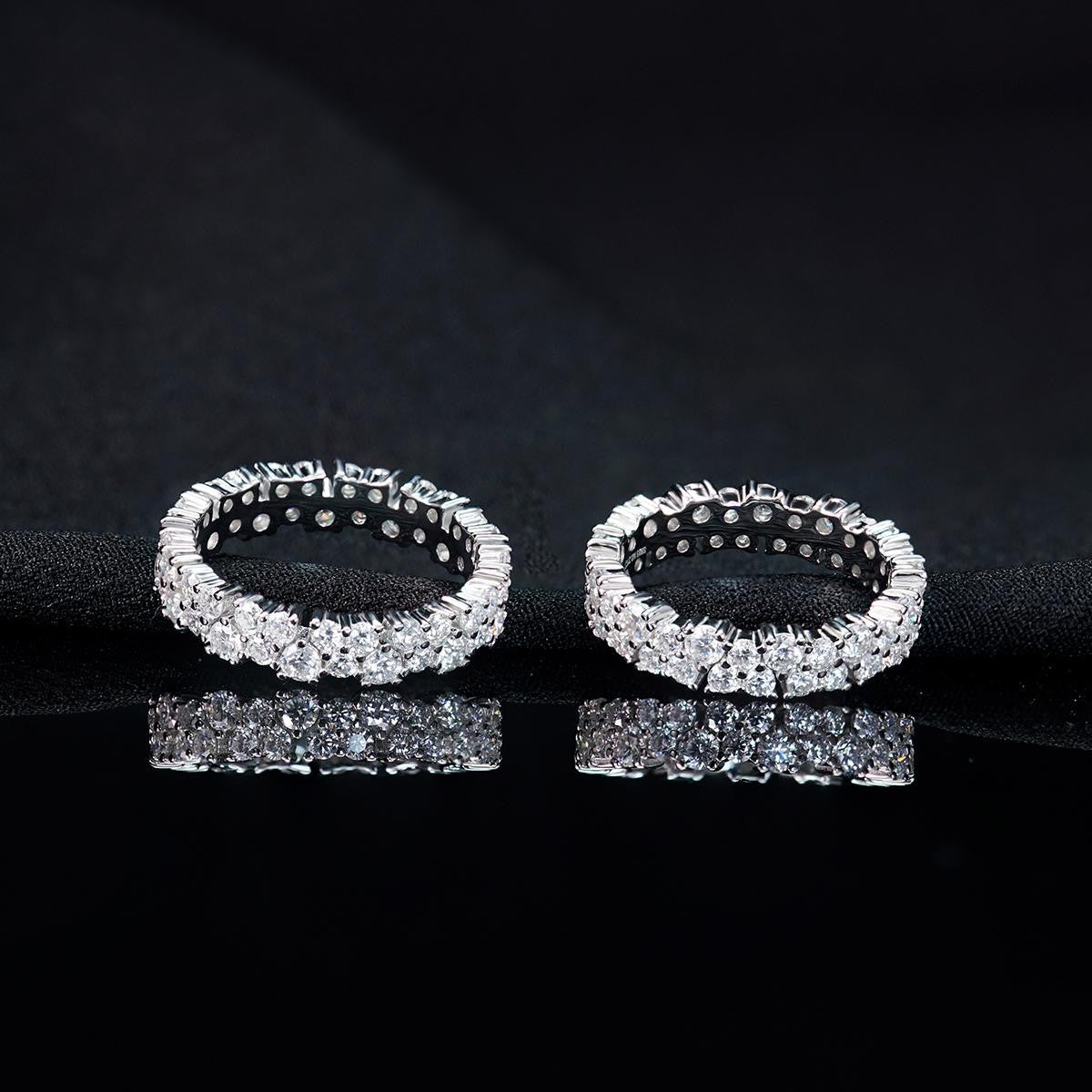 Duette 2.5 Carat Double Row Moissanite Eternity Ring in Sterling Silver — pair on black