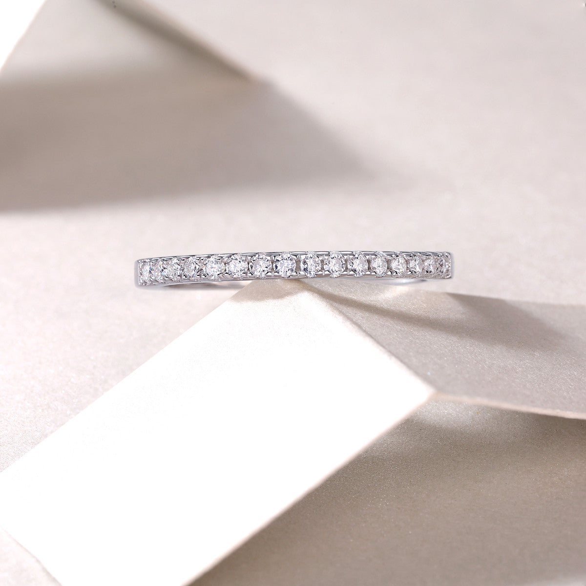 Halfway Moissanite Half Eternity Band Ring in Sterling Silver, styled product photo