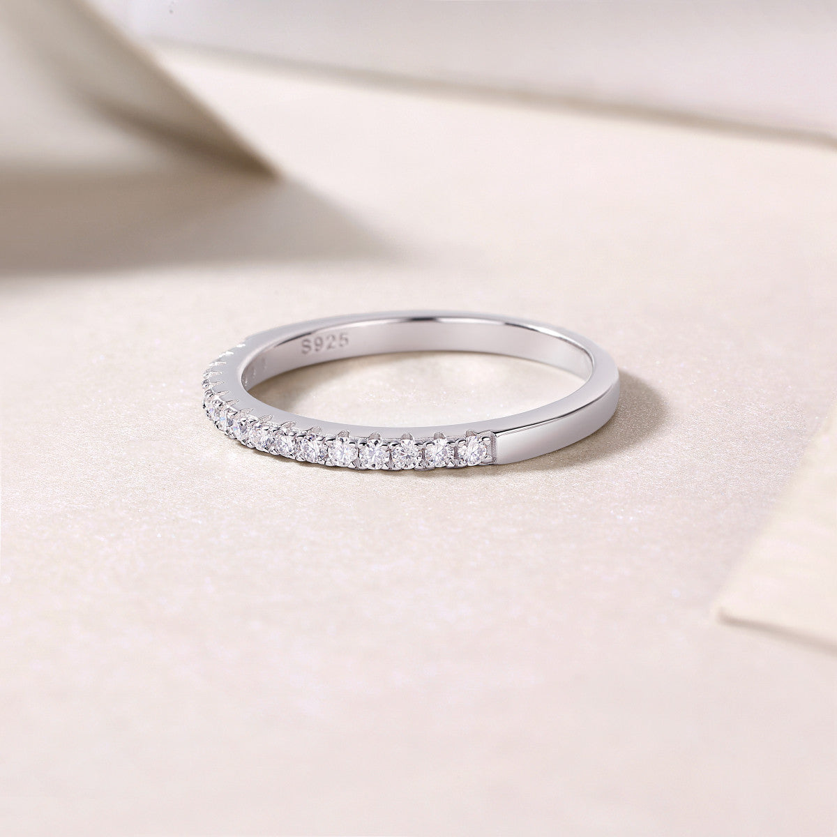 Halfway Moissanite Half Eternity Band Ring in Sterling Silver, styled product photo