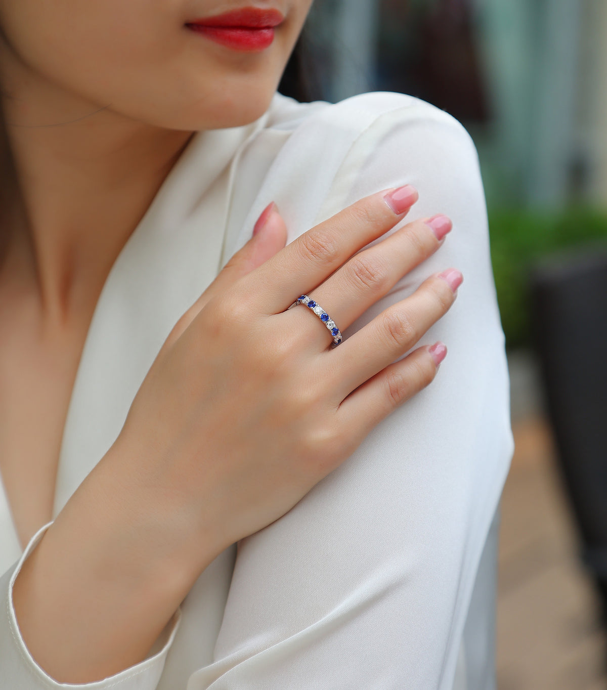Azure Lab-Grown Sapphire & Moissanite Eternity Band Ring in Sterling Silver, shown worn