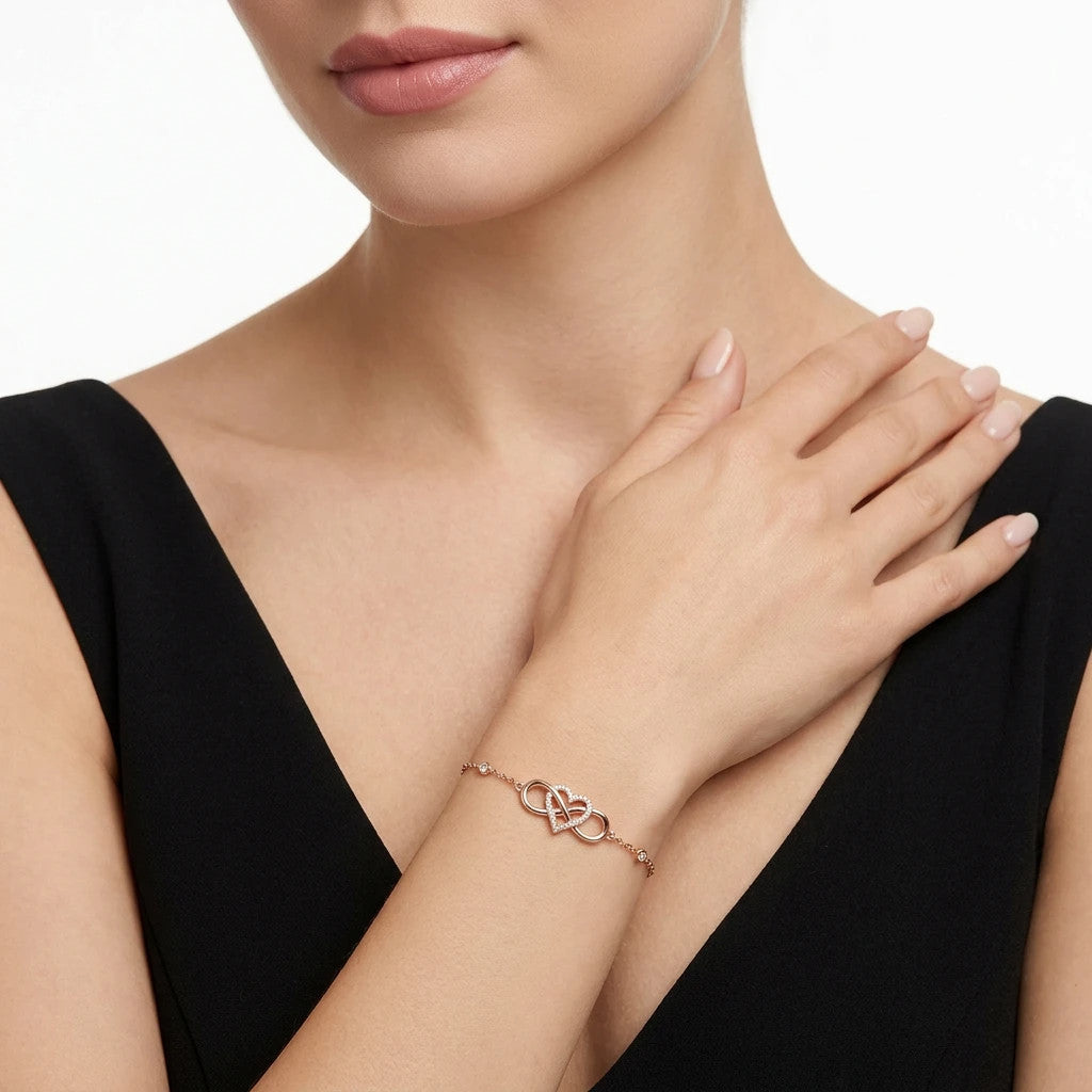 Affetto Moissanite Infinity Bracelet in Rose Gold-Tone Sterling Silver, shown worn