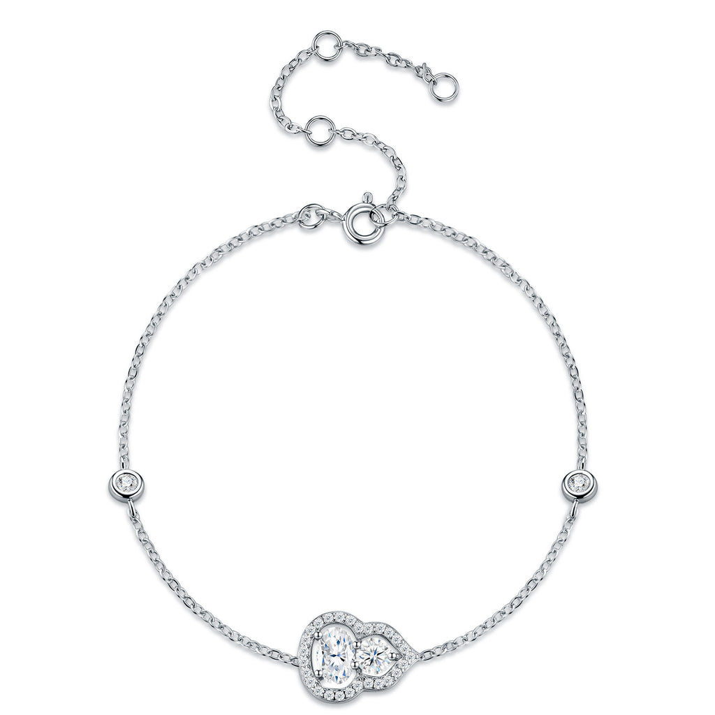 Benedetta Oval-Cut Moissanite Halo Chain Bracelet in Sterling Silver, product photo on white background