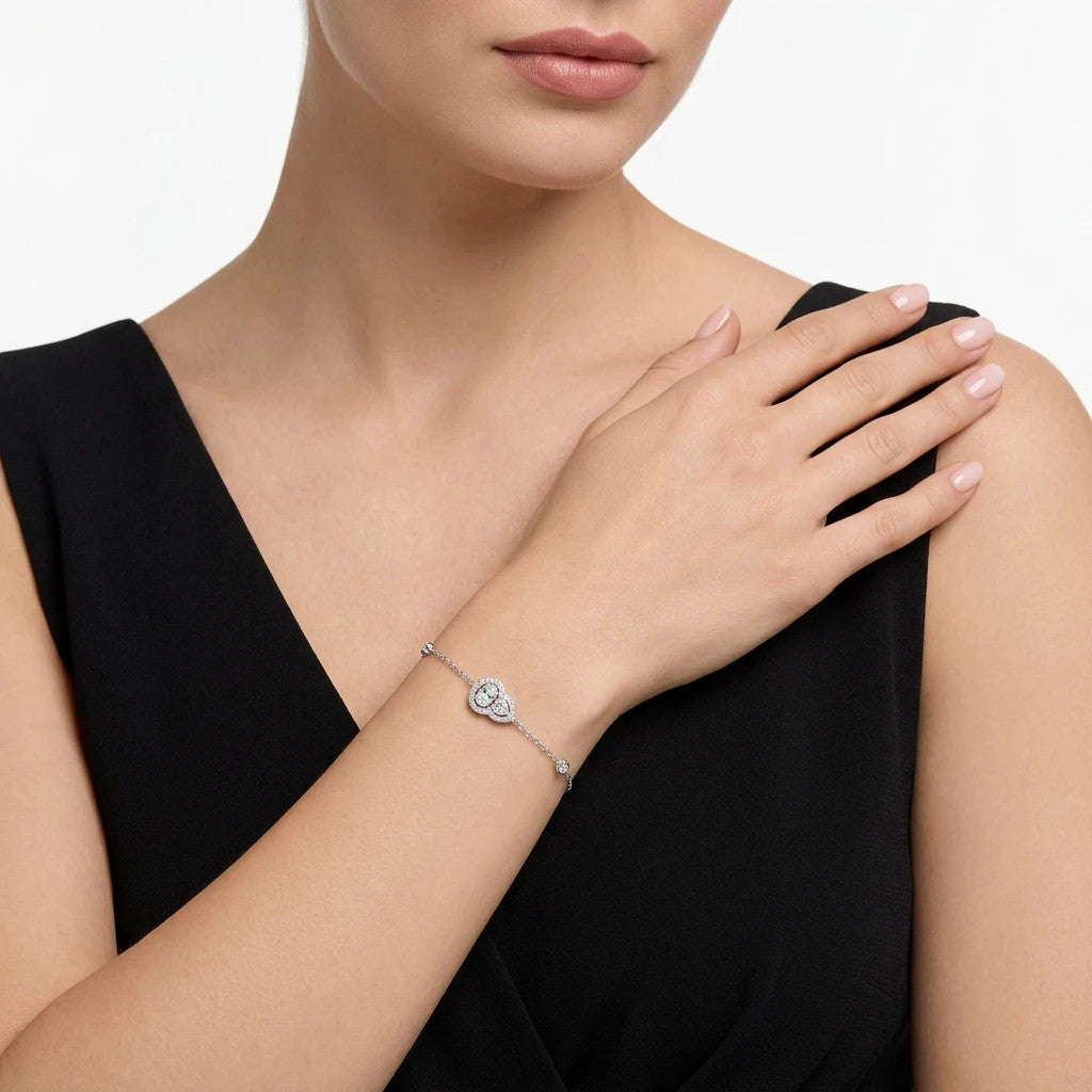 Benedetta Oval-Cut Moissanite Halo Chain Bracelet in Sterling Silver, shown worn