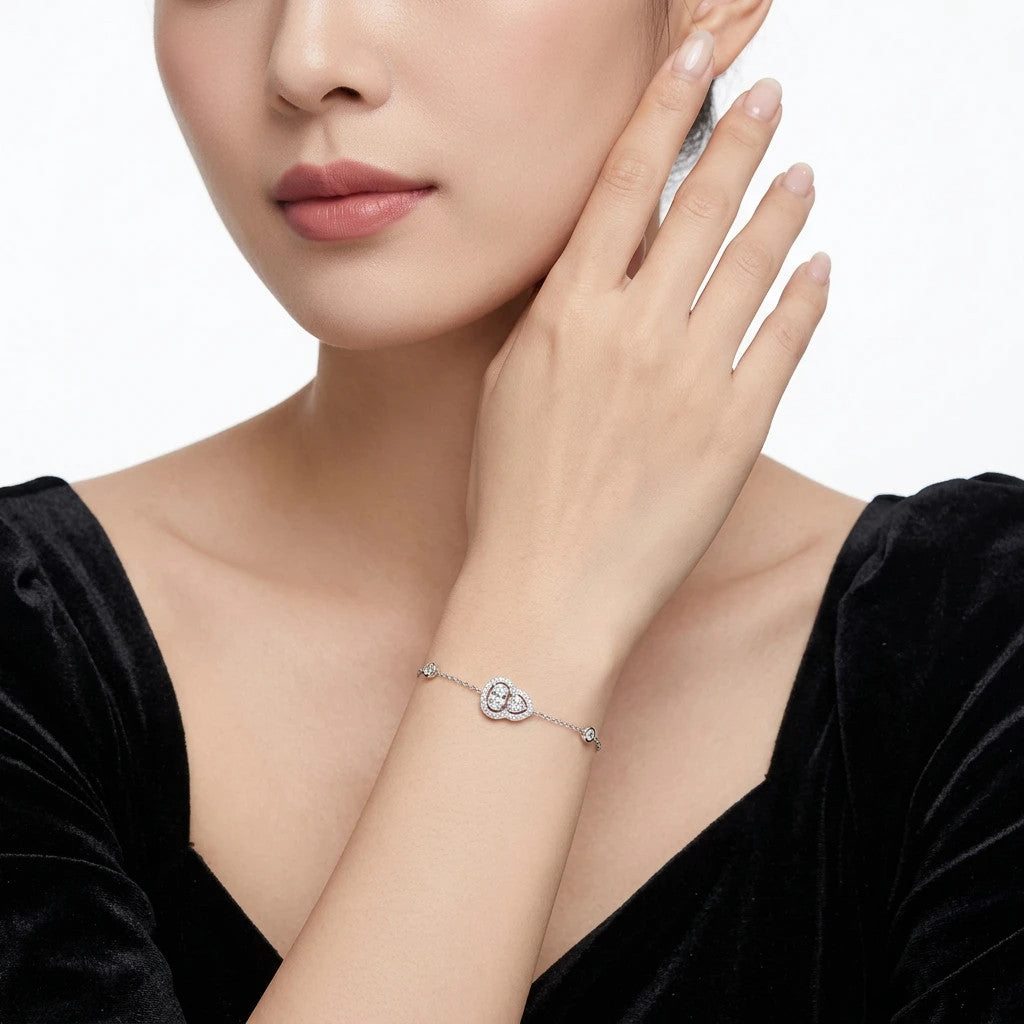 Benedetta Oval-Cut Moissanite Halo Chain Bracelet in Sterling Silver, shown worn