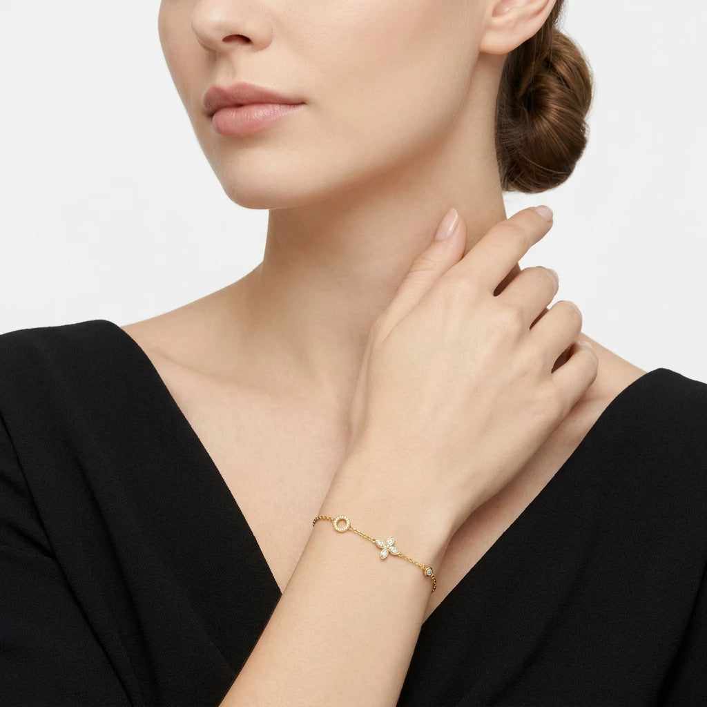 Armonia Moissanite Station Bracelet in Gold-Tone Sterling Silver, shown worn