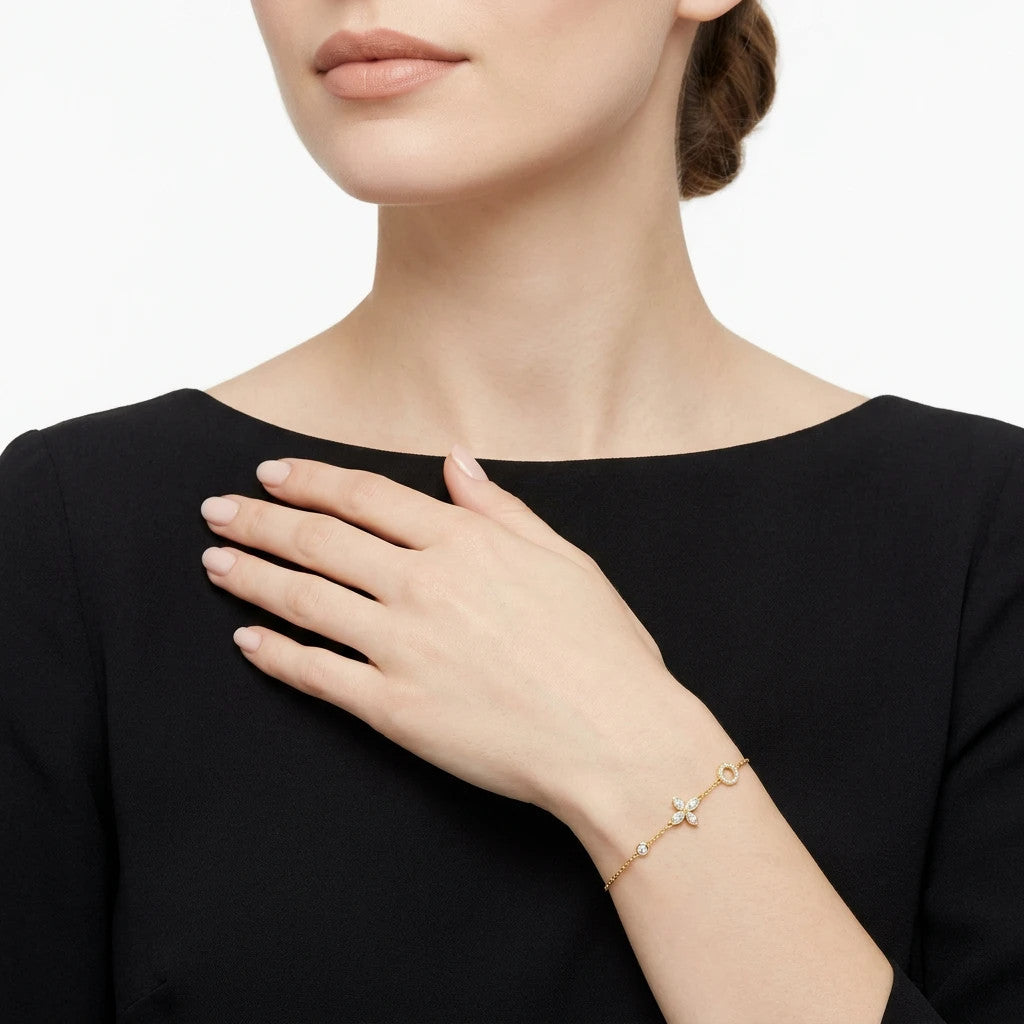 Armonia Moissanite Station Bracelet in Gold-Tone Sterling Silver, shown worn