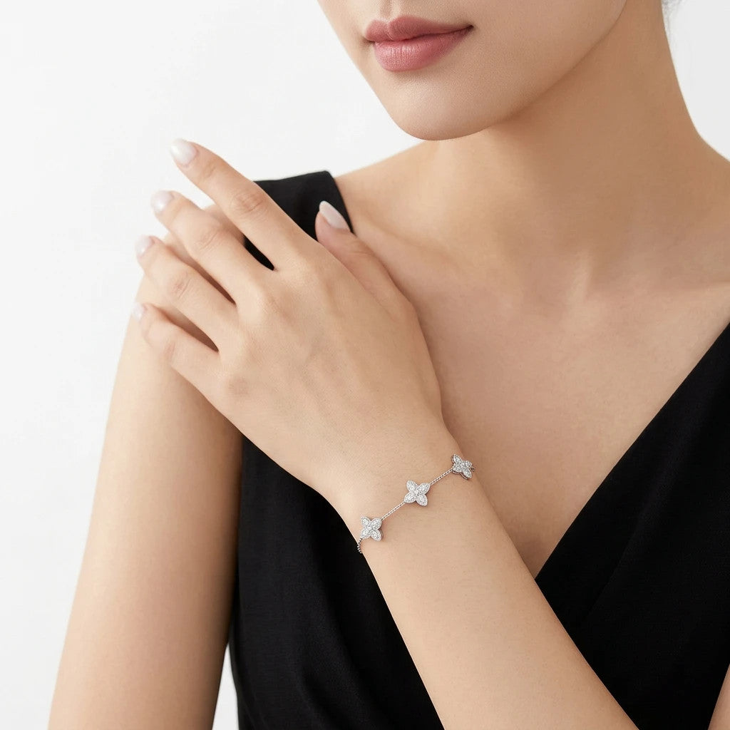 Biancospino Moissanite Flower Station Bracelet in Sterling Silver, shown worn