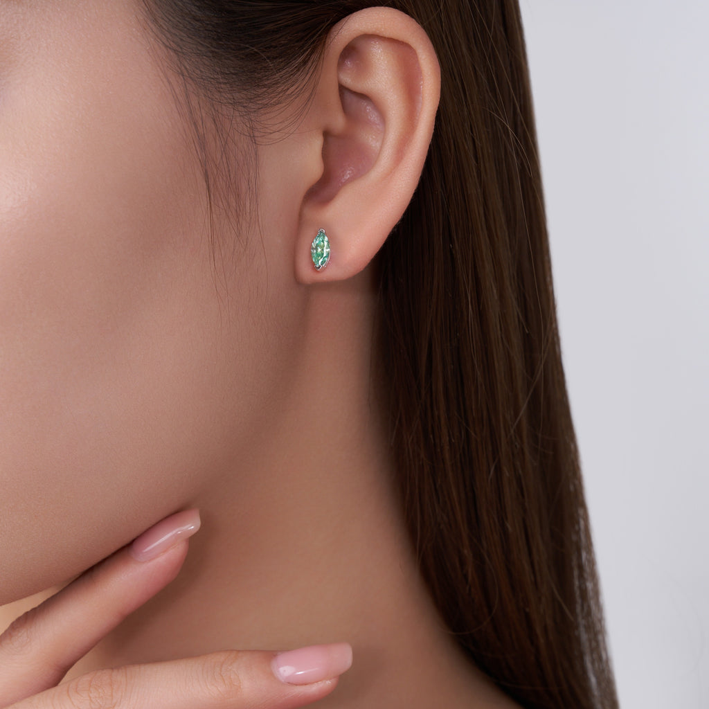 Baia Marquise-Cut Teal Moissanite Stud Earrings in Sterling Silver, shown worn