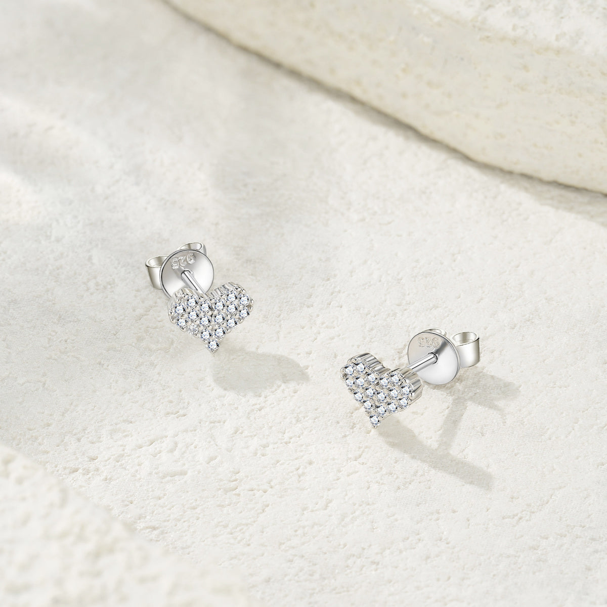 Bacetto Moissanite Heart Cluster Stud Earrings in Sterling Silver, styled product photo