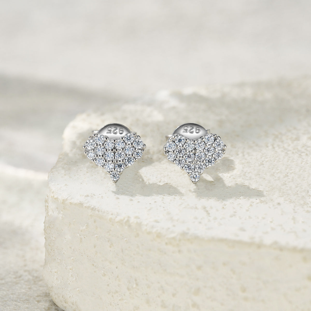 Bacetto Moissanite Heart Cluster Stud Earrings in Sterling Silver, styled product photo