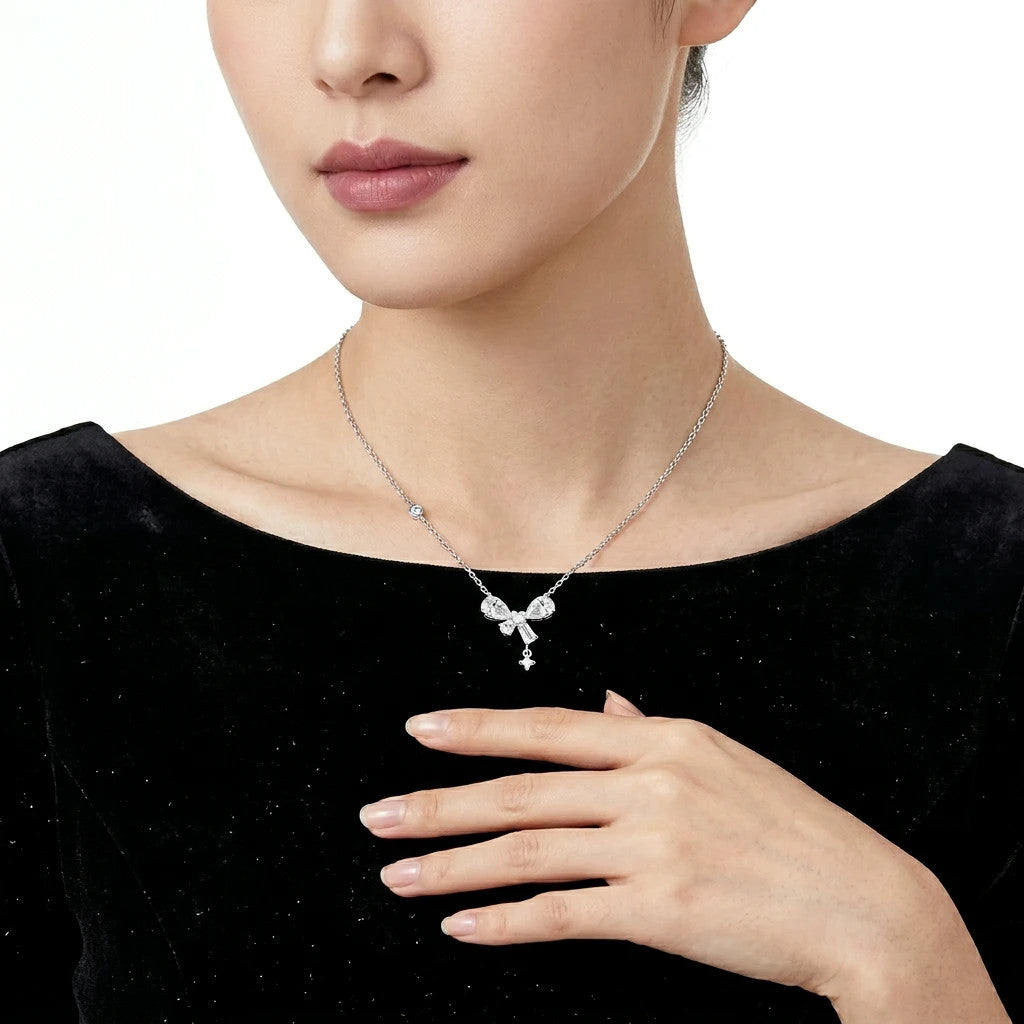 Galante Moissanite Bow Pendant Necklace in Sterling Silver, shown worn