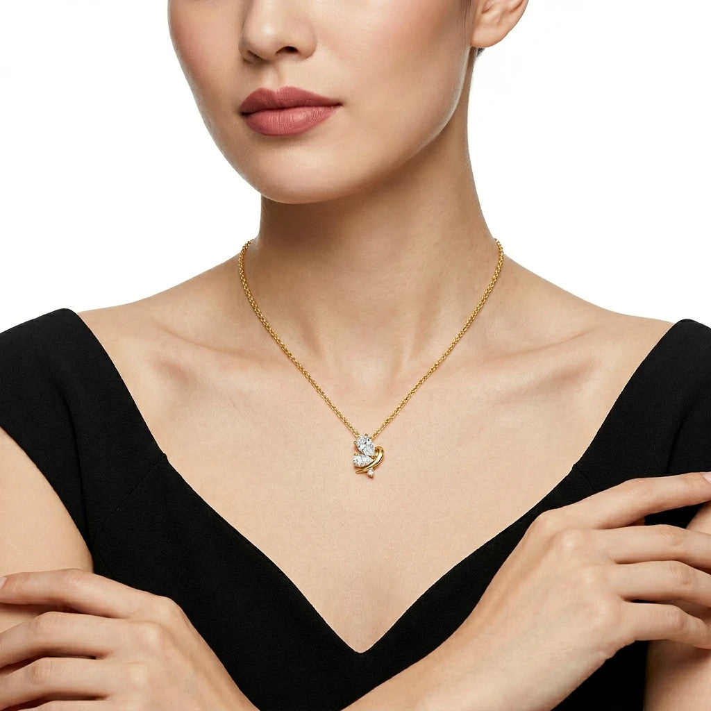 Ginestra Moissanite Pear Pendant Necklace in Gold-Tone Sterling Silver, shown worn