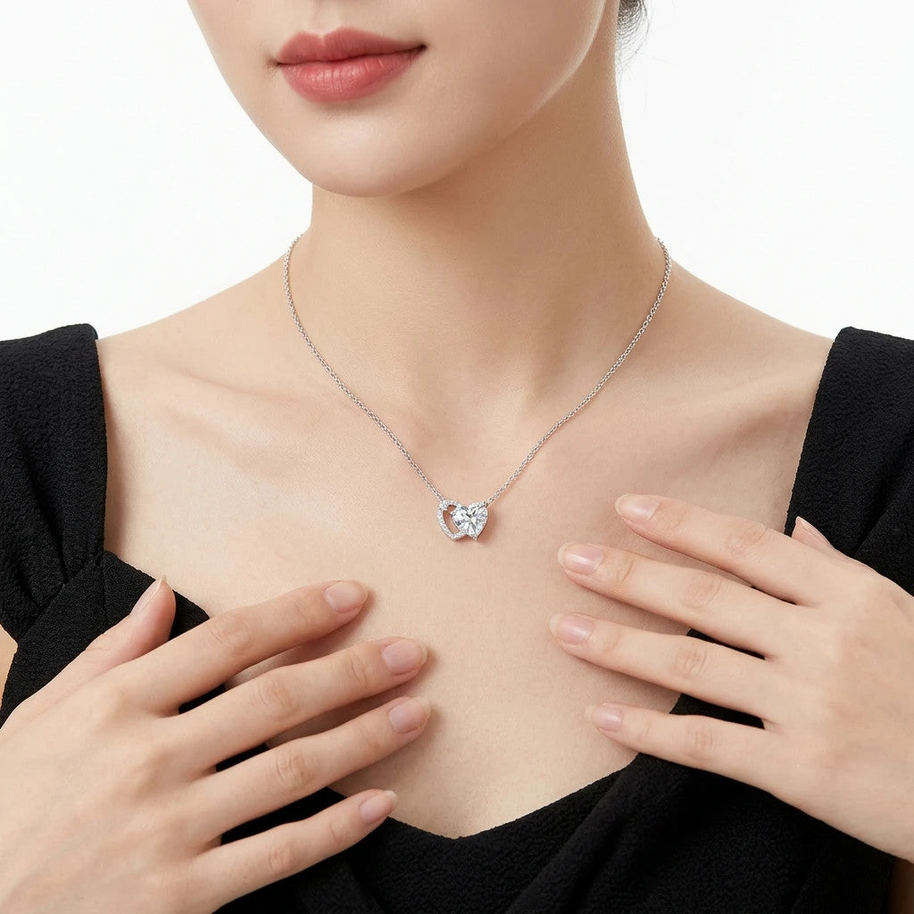 Inseparabile Moissanite Double Heart Necklace in Sterling Silver, shown worn