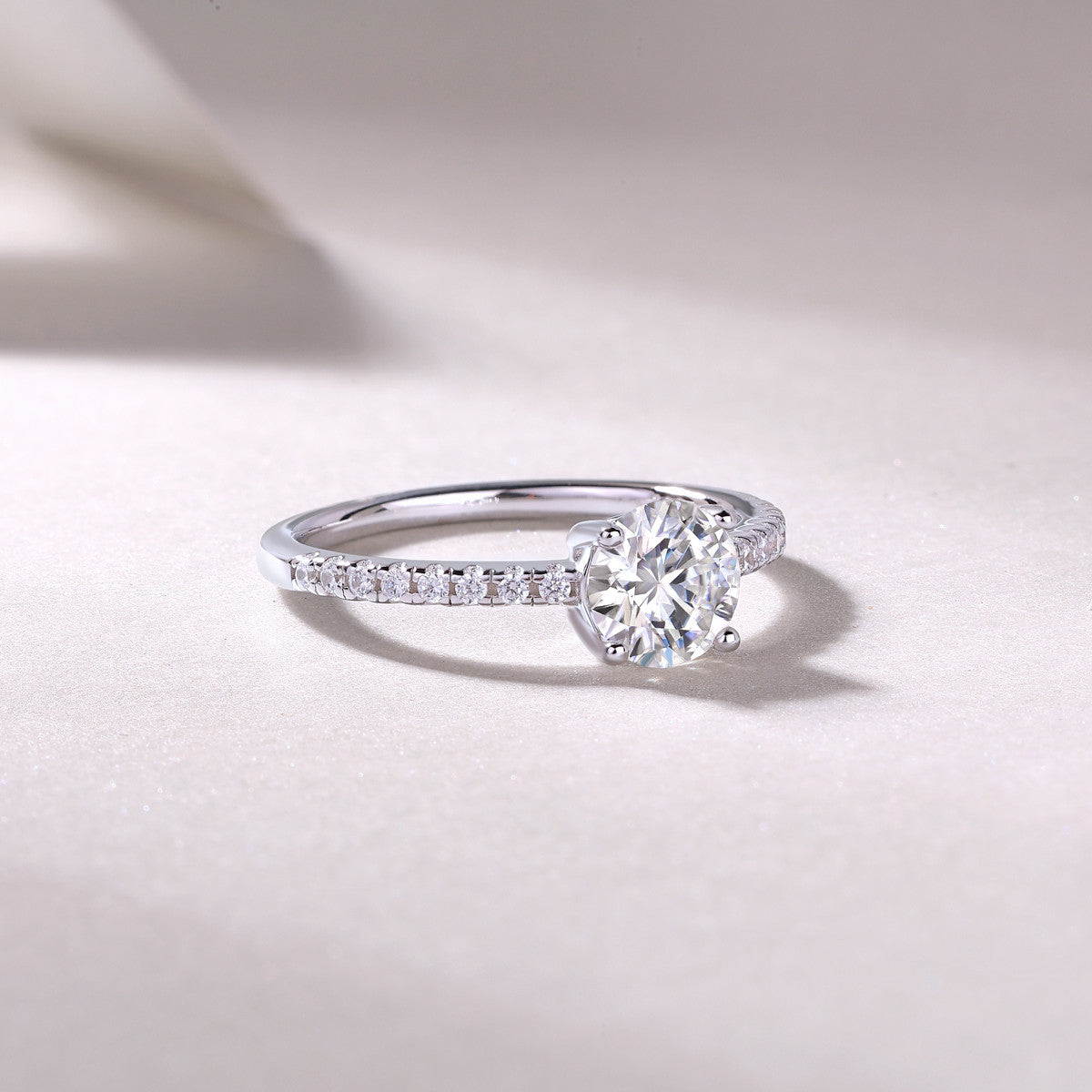 Kindred Round Moissanite Solitaire Engagement Ring in Sterling Silver, styled product photo