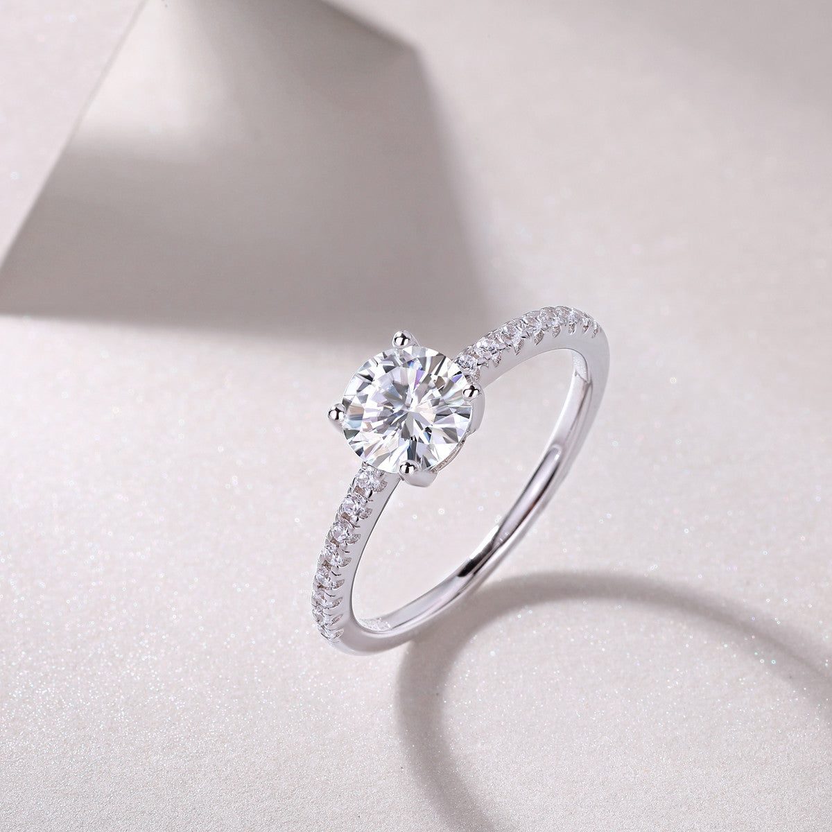 Kindred Round Moissanite Solitaire Engagement Ring in Sterling Silver, styled product photo