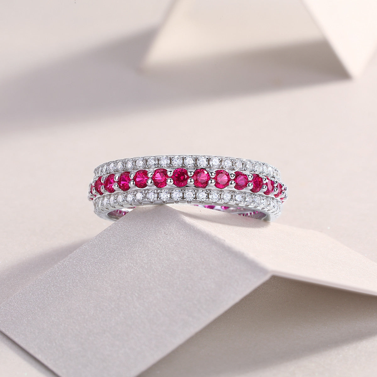 Melograno Lab-Created Ruby Eternity Band Ring in Sterling Silver, styled product photo