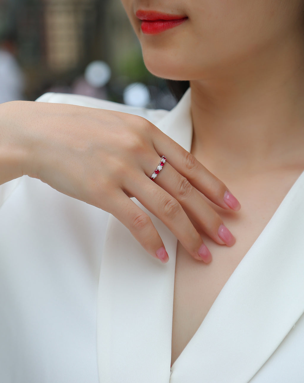 Madrigale Lab-Created Ruby Eternity Band Ring in Sterling Silver, shown worn