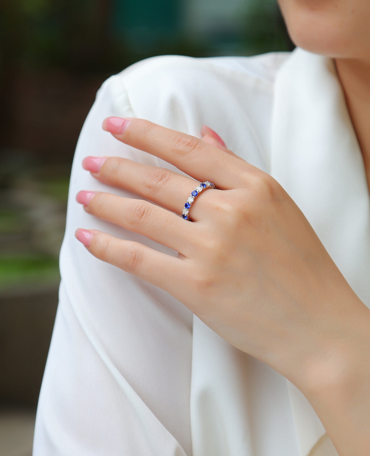 Mezzanotte Lab-Created Sapphire Eternity Band Ring in Sterling Silver, shown worn