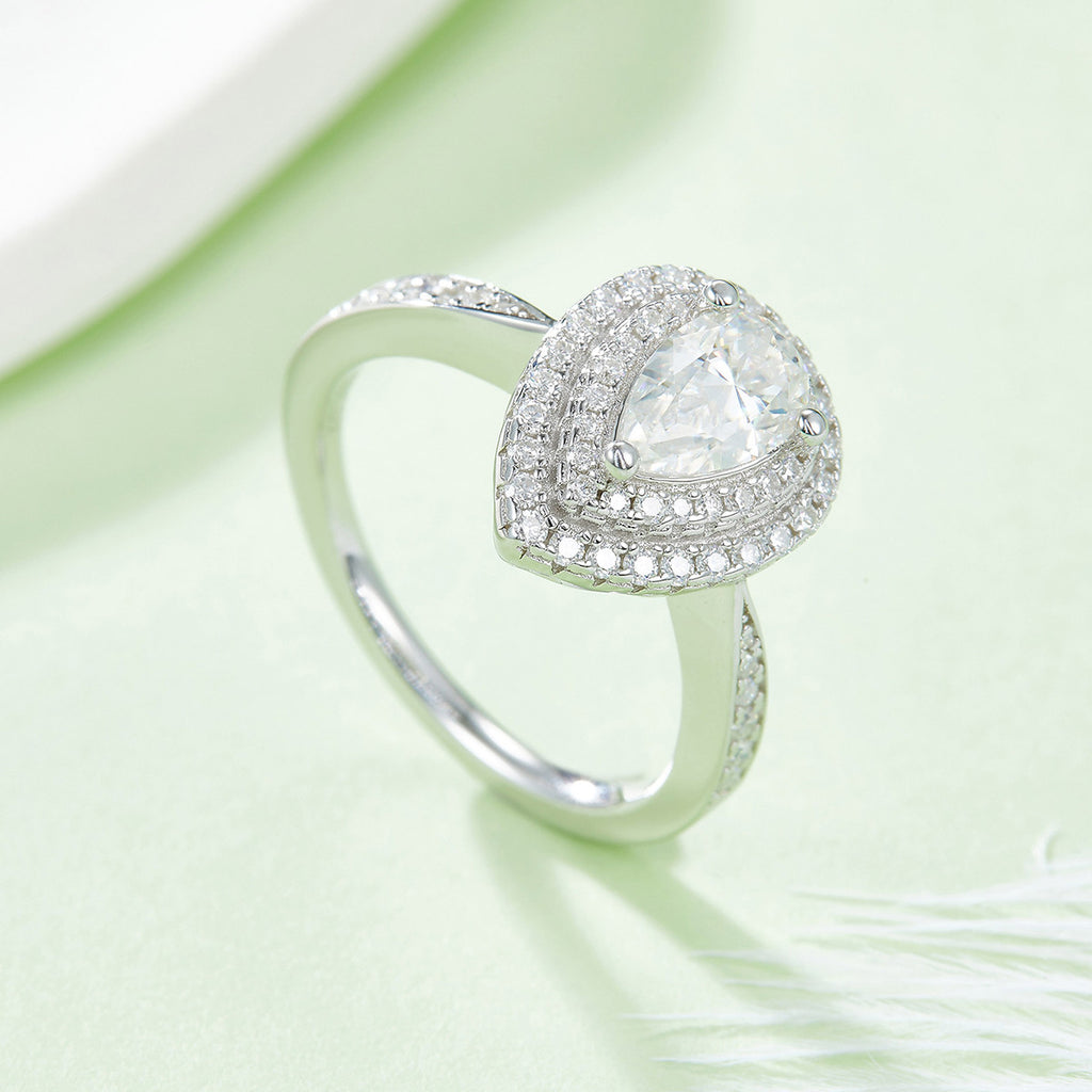 Ondina 1 Carat Pear-Cut Moissanite Double Halo Ring in Sterling Silver, styled product photo