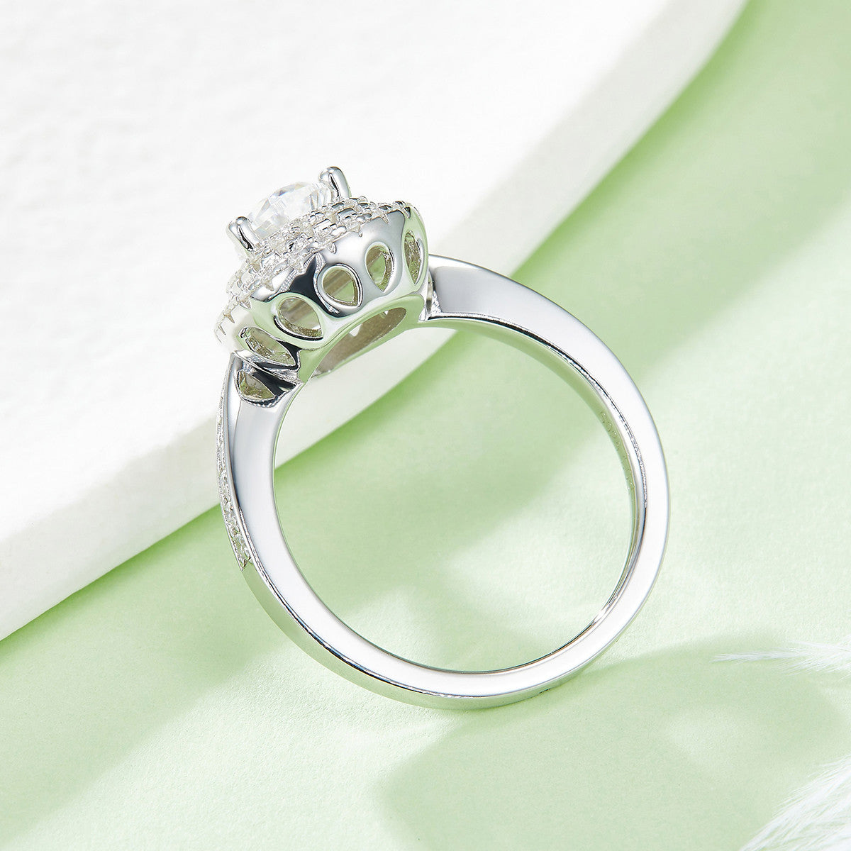 Ondina 1 Carat Pear-Cut Moissanite Double Halo Ring in Sterling Silver, styled product photo