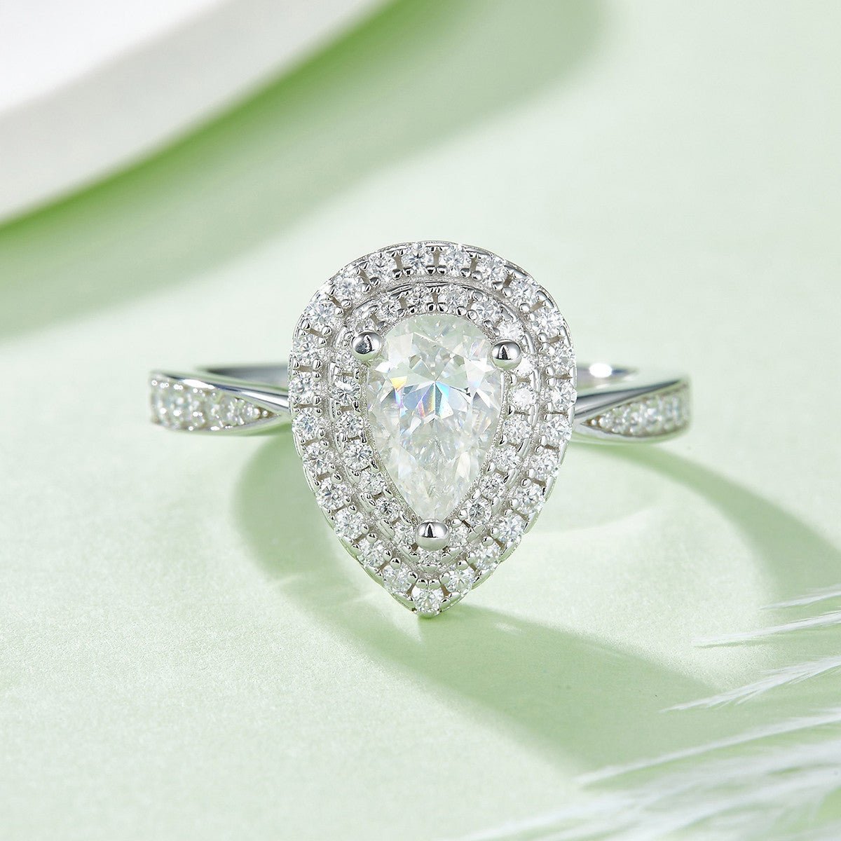 Ondina 1 Carat Pear-Cut Moissanite Double Halo Ring in Sterling Silver, styled product photo