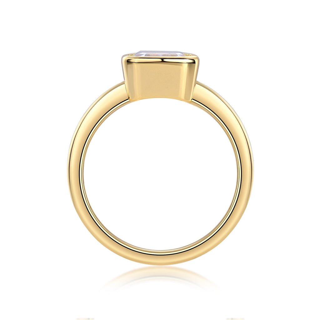 Mirador 3 Carat Emerald-Cut Moissanite Bezel Ring in Gold-Tone Sterling Silver, product photo on white background