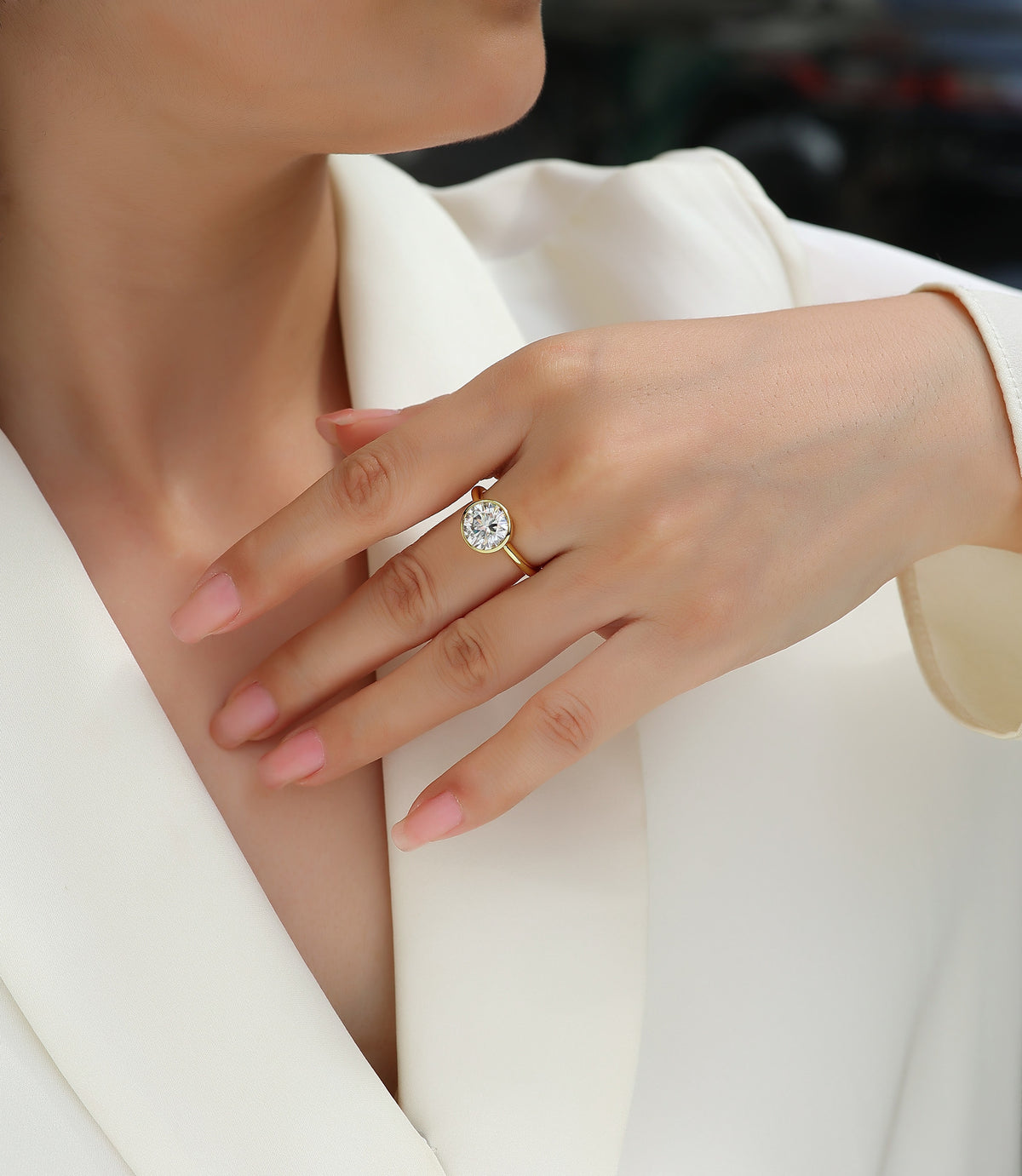 Ora 3 Carat Moissanite Bezel Solitaire Ring in Gold-Tone Sterling Silver, shown worn