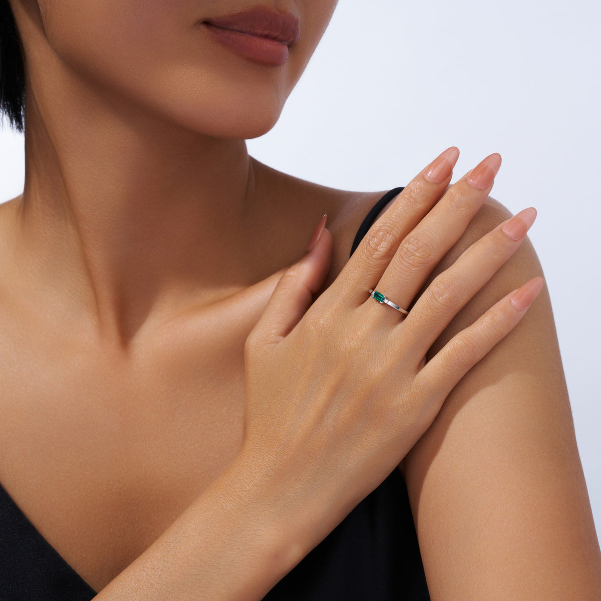 Olea Emerald-Cut Lab-Grown Emerald Solitaire Ring in Sterling Silver, shown worn