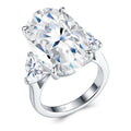 Tramonto Oval-Cut Moissanite Three-Stone Ring in Sterling Silver