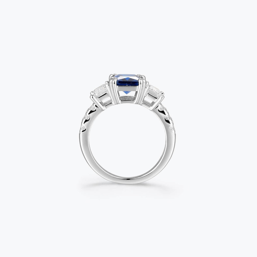 Azzurra blue cubic zirconia three-stone ring, profile view